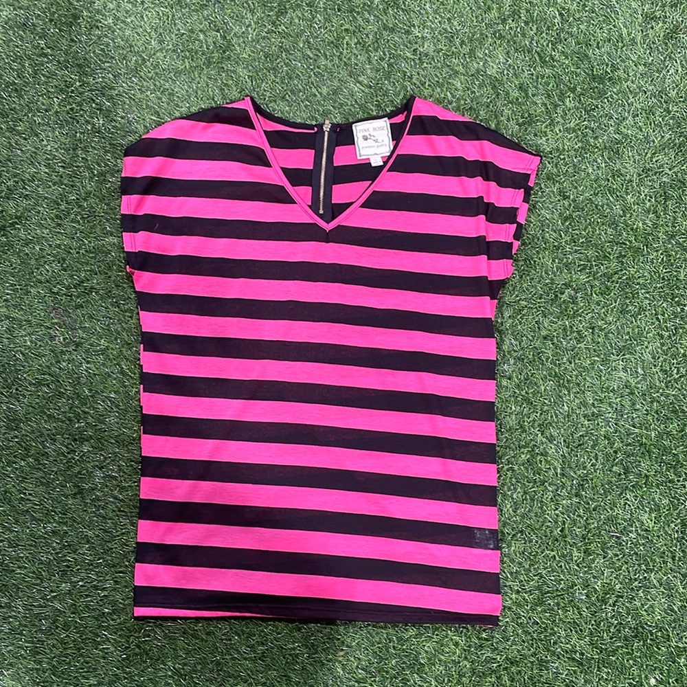Ladies cap sleeved black and pink shirt with zipper detail on back of neck.